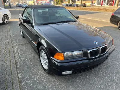 Gebraucht BMW 318 116 PS (85 kW) 1999 Cosmosschwarzmetallic (metallic) Cabrio