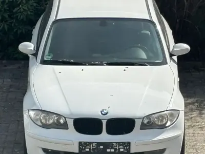 Używany BMW 116 122 KM (89 kW) 2008 Biały Hatchback