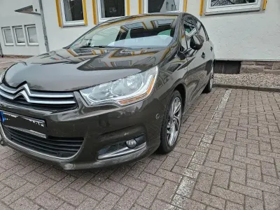 Gebraucht Citroën C4 Exclusive 114 PS (83 kW) 2013 Braun Limousine
