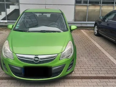 Gebraucht Opel Corsa 69 PS (50 kW) 2011 Grün Kleinwagen