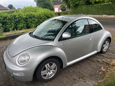 Gebraucht VW New Beetle 116 PS (85 kW) 1999 Silber Kleinwagen