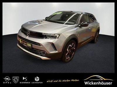 Gebraucht Opel Mokka-e Ultimate 100 kW (136 PS) 2022 Kontrast grau/quarz silber SUV