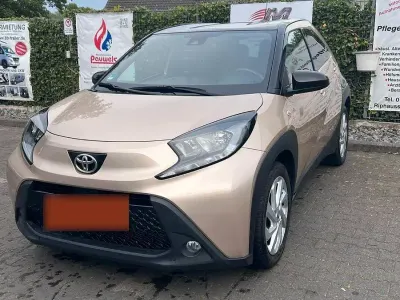 Gebraucht Toyota Aygo Pulse 72 PS (52 kW) 2022 Beige Kleinwagen
