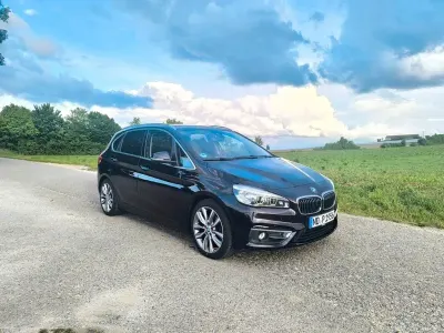 Używany BMW 220 Active Tourer Luxury Line 192 KM (141 kW) 2015 Brązowy Minivan