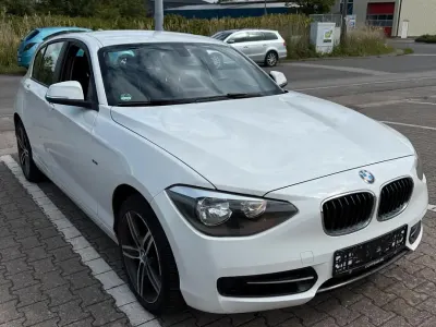 Używany BMW 116 Sport Line 136 KM (100 kW) 2014 Biały Hatchback