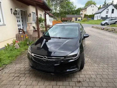 Używany Opel Astra Dynamic 125 KM (91 kW) 2019 Czarny Kombi