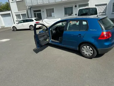 Używany VW Golf V 140 KM (102 kW) 2007 Niebieski Hatchback
