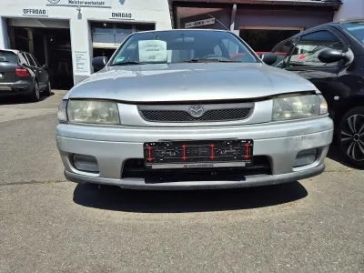 Gebraucht Mazda 323 88 PS (64 kW) 1999 Silber Kleinwagen