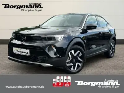 Gebraucht Opel Mokka-e Elegance 100 kW (136 PS) 2022 Diamant schwarz/karbon schwarz SUV