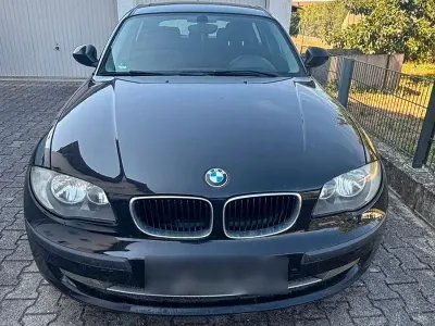 Gebraucht BMW 116 122 PS (89 kW) 2009 Schwarz Kleinwagen