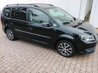 Second-hand VW Touran 105 CP (77 kW) 2013 Negru Monovolum