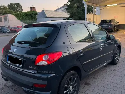 Gebraucht Peugeot 206+ 75 PS (55 kW) 2009 Blau Kleinwagen