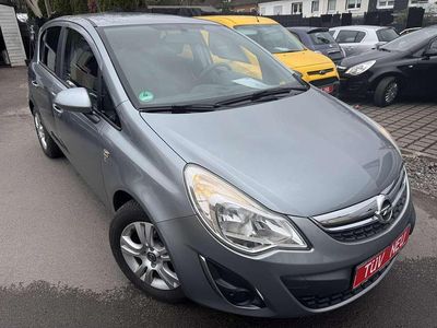 Używany Opel Corsa 69 KM (50 kW) 2012 Srebrny Hatchback