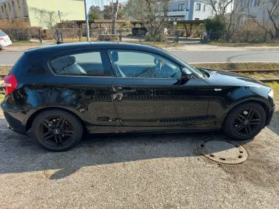 Używany BMW 116 122 KM (89 kW) 2010 Czarny Hatchback