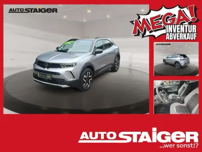 Gebraucht Opel Mokka Elegance 131 PS (96 kW) 2022 Tiefquarz grau/quarz silber SUV