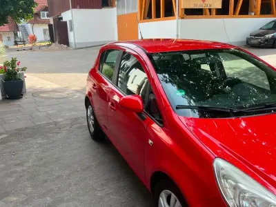 Gebraucht Opel Corsa 83 PS (61 kW) 2012 Rot Kleinwagen