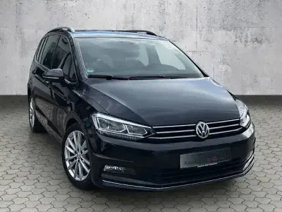 Second-hand VW Touran Highline 190 CP (139 kW) 2018 Negru Monovolum