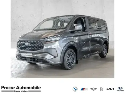 Gebraucht Ford Tourneo Custom Titanium 233 PS (171 kW) 2024 Grau Van