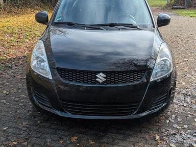 Begagnad Suzuki Swift 94 HK (69 kW) 2013 Svart Halvkombi