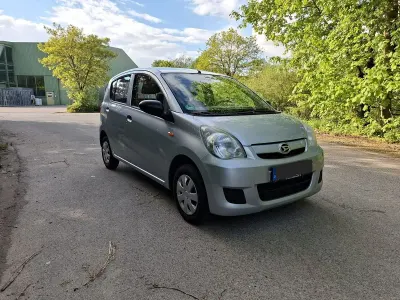 Gebraucht Daihatsu Cuore 69 PS (50 kW) 2011 Silber Kleinwagen