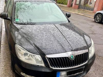 Second-hand Skoda Octavia 105 CP (77 kW) 2012 Negru Break