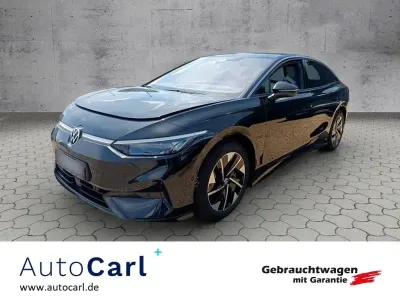 Gebraucht VW ID.7 Pro 210 kW (286 PS) 2024 Grenadillschwarz metallic Limousine