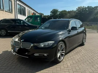 Gebraucht BMW 318 143 PS (105 kW) 2013 Schwarz Kombi