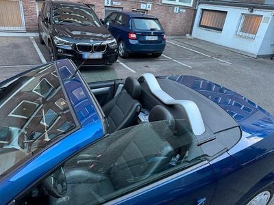 Second-hand Opel Tigra 125 CP (91 kW) 2005 Albastru Cabrio