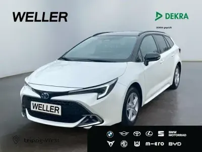 Gebraucht Toyota Corolla 196 PS (144 kW) 2025 Platinumweiß perleffekt / dach Kombi