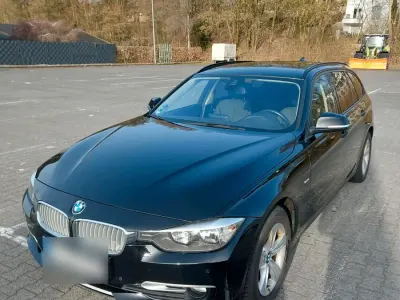 Gebraucht BMW 320 183 PS (134 kW) 2014 Schwarz Kombi