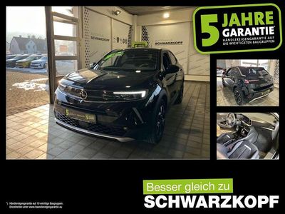 Gebraucht Opel Mokka-e 100 kW (136 PS) 2022 Diamant schwarz/karbon schwarz SUV