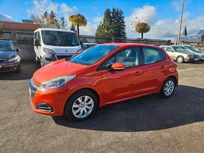 Gebraucht Peugeot 208 Active 82 PS (60 kW) 2015 Orange Kleinwagen