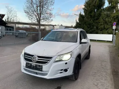 Second-hand VW Tiguan Sportline 140 CP (102 kW) 2010 Alb SUV