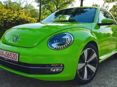 Gebraucht VW Beetle Exclusive 105 PS (77 kW) 2013 Grün Kleinwagen