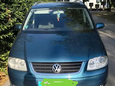 Gebraucht VW Touran 140 PS (102 kW) 2006 Blau Van / Kleinbus