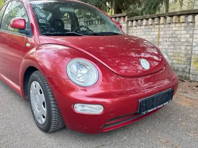 Gebraucht VW New Beetle 116 PS (85 kW) 1999 Canyonred perleffekt Kleinwagen