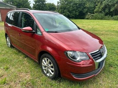 Second-hand VW Touran Freestyle 140 CP (102 kW) 2009 Roșu Monovolum