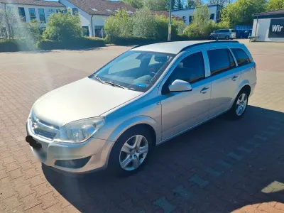 Second-hand Opel Astra 120 CP (88 kW) 2009 Argintiu Break