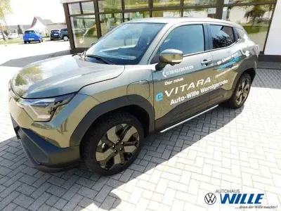 Gebraucht Suzuki e-Vitara Comfort+ 135 kW (184 PS) 2026 Grün SUV