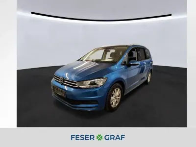 Gebraucht VW Touran Comfortline 150 PS (110 kW) 2023 Caribbean blue metallic Van / Kleinbus