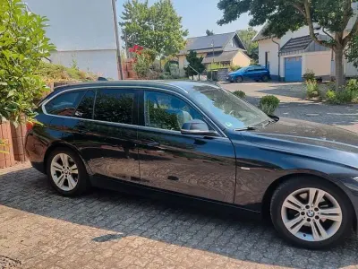 Gebraucht BMW 320 Luxury Line 184 PS (135 kW) 2013 Schwarz Kombi
