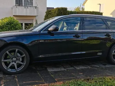 Używany Audi A6 177 KM (130 kW) 2014 Czarny Kombi