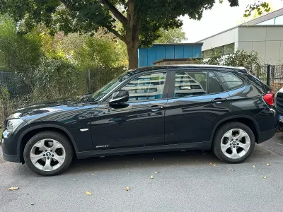 Używany BMW X1 143 KM (105 kW) 2011 Czarny SUV