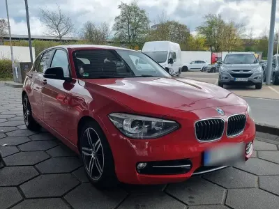 Gebraucht BMW 116 Sport Line 136 PS (100 kW) 2012 Rot Kleinwagen