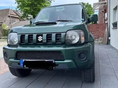 Używany Suzuki Jimny Club 84 KM (61 kW) 2013 Zielony SUV