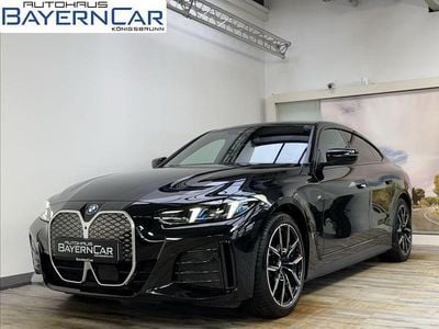 (0475) saphirschwarz metallic Gebraucht 2024 BMW i4 M Sport Limousine | 52.989 € (Fairer Preis)