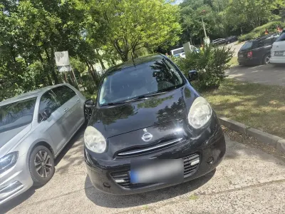 Gebraucht Nissan Micra 57 PS (41 kW) 2011 Schwarz Kleinwagen