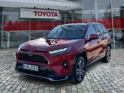 Gebraucht Toyota RAV4 Hybrid 306 PS (225 kW) 2025 Karminarot metallic SUV