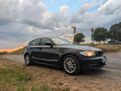 Gebraucht BMW 116 Lifestyle 122 PS (89 kW) 2011 Schwarz Kleinwagen
