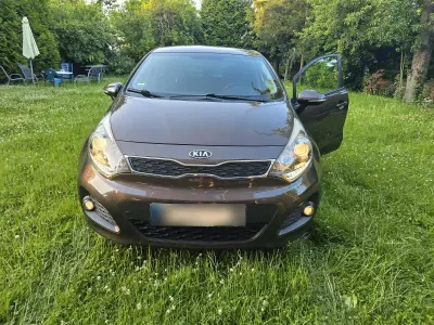 Gebraucht Kia Rio 84 PS (61 kW) 2013 Braun Limousine